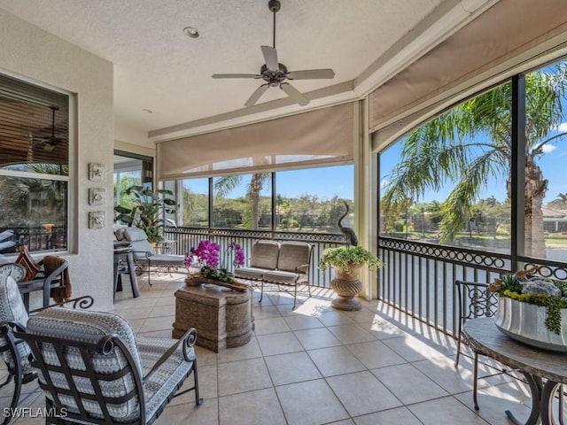 sunroom / solarium with ceiling fan