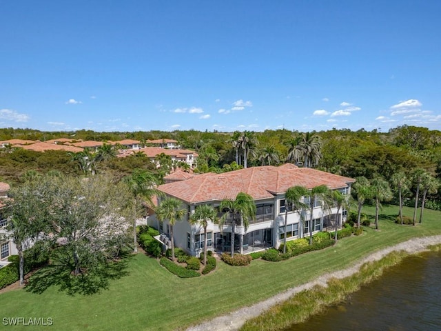 drone / aerial view with a water view