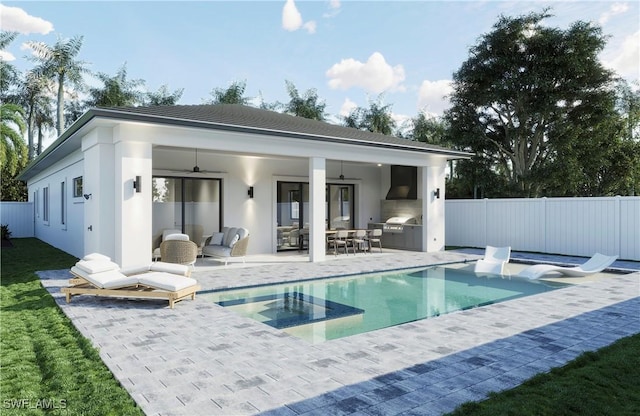 rear view of property with a patio area, ceiling fan, fence, and an outdoor kitchen