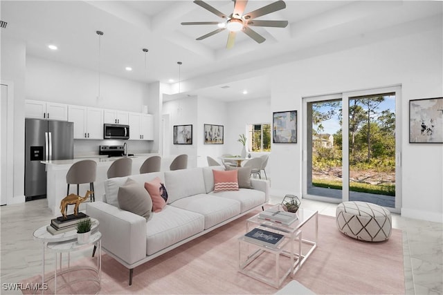 living room featuring ceiling fan, recessed lighting, a towering ceiling, marble finish floor, and coffered ceiling