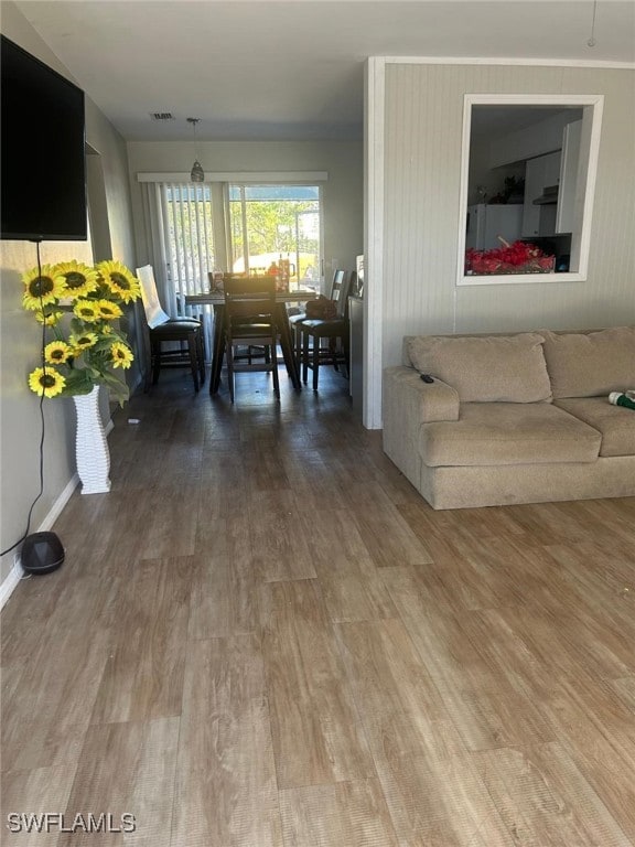949-949 NE Pine Island Ln Unit 947, Cape Coral, FL 33909 - living room featuring wood finished floors