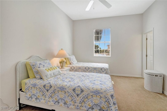 bedroom with carpet flooring, baseboards, and ceiling fan