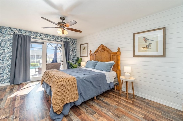 bedroom featuring access to exterior, hardwood / wood-style floors, baseboards, wallpapered walls, and ceiling fan
