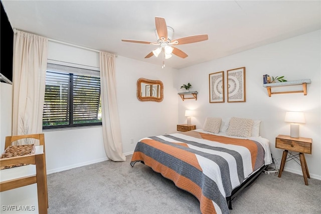 bedroom featuring carpet, baseboards, and ceiling fan
