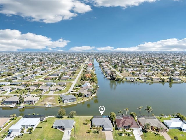 aerial view with a residential view and a water view