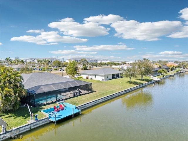 view of dock featuring a water view, a lanai, a residential view, a swimming pool, and a yard