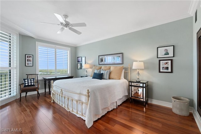 bedroom featuring ceiling fan, baseboards, dark wood-style flooring, and ornamental molding