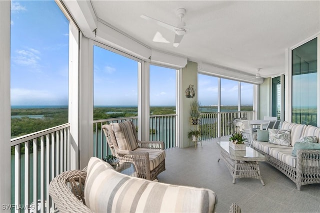 sunroom with a ceiling fan