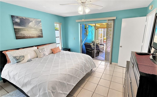 bedroom featuring ceiling fan, multiple windows, light tile patterned flooring, and access to outside