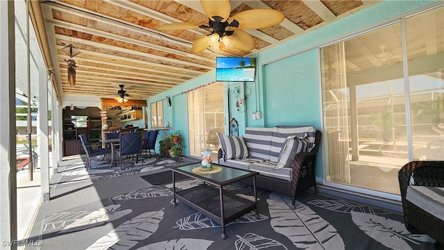 view of patio / terrace featuring ceiling fan