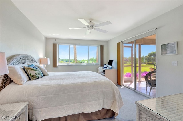 bedroom featuring light carpet, a ceiling fan, and access to exterior