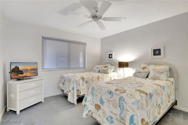 bedroom featuring carpet floors, ceiling fan, and baseboards