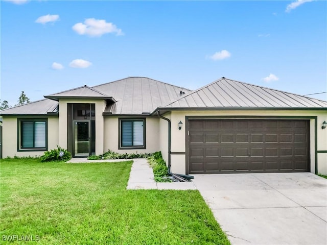 view of front facade featuring concrete driveway, stucco siding, metal roof, a standing seam roof, and a front yard