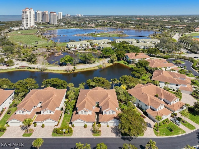 aerial view with a water view and a residential view