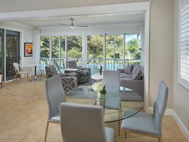 sunroom / solarium with ceiling fan and a wealth of natural light