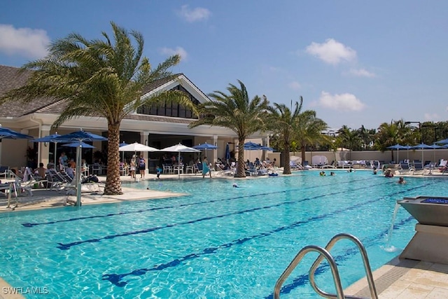 pool with a patio area