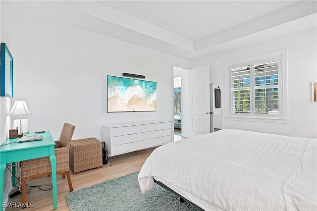 bedroom featuring wood finished floors