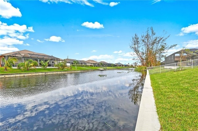 water view with a residential view and fence