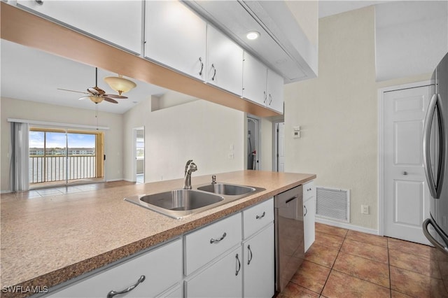 kitchen featuring a ceiling fan, visible vents, a sink, white cabinets, and appliances with stainless steel finishes