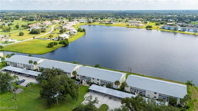 birds eye view of property featuring a residential view and a water view