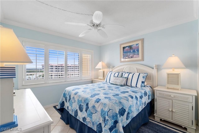 bedroom featuring tile patterned flooring, crown molding, a ceiling fan, and baseboards