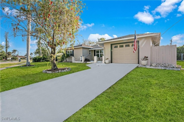 single story home featuring a garage, concrete driveway, a front lawn, and stucco siding