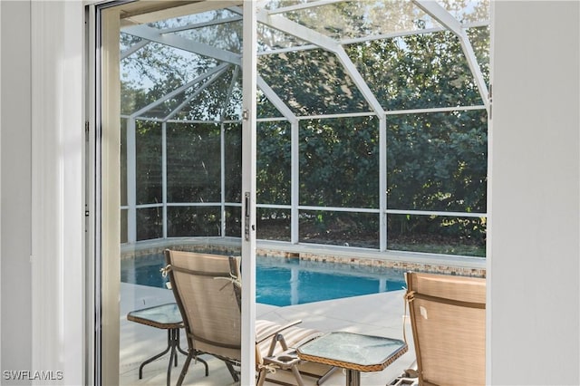 pool featuring glass enclosure