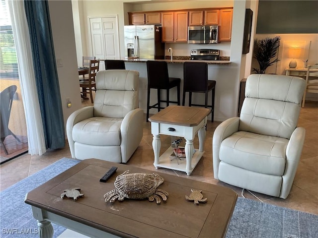 living room with light tile patterned floors