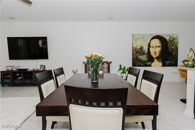 dining room featuring tile patterned floors and visible vents