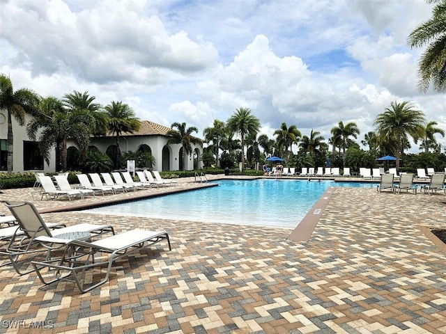 pool with a patio area