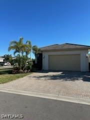 view of front of house with driveway and an attached garage