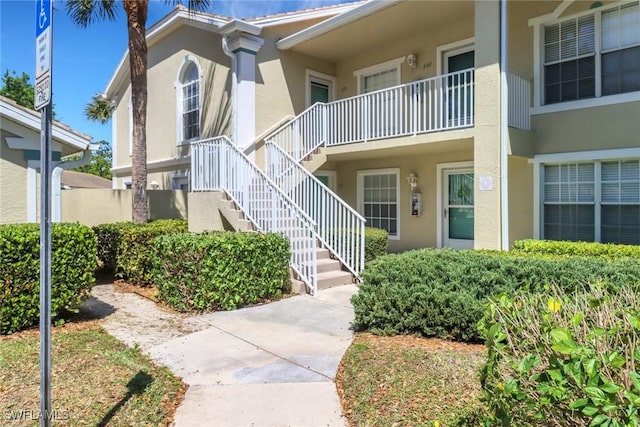 22741 Sandy Bay Dr Unit 201, Estero, FL 33928 - view of property with stairway