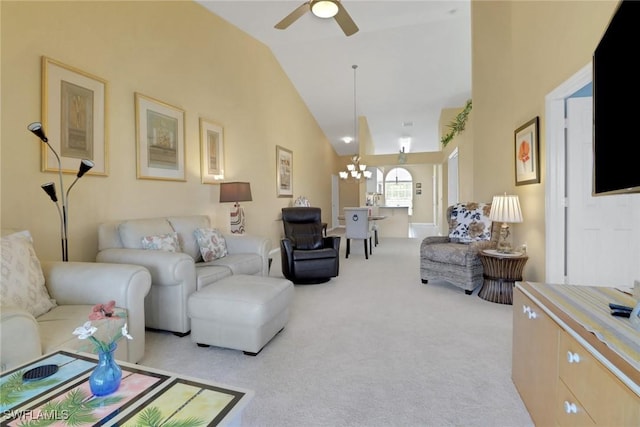 22741 Sandy Bay Dr Unit 201, Estero, FL 33928 - carpeted living room featuring ceiling fan with notable chandelier and high vaulted ceiling