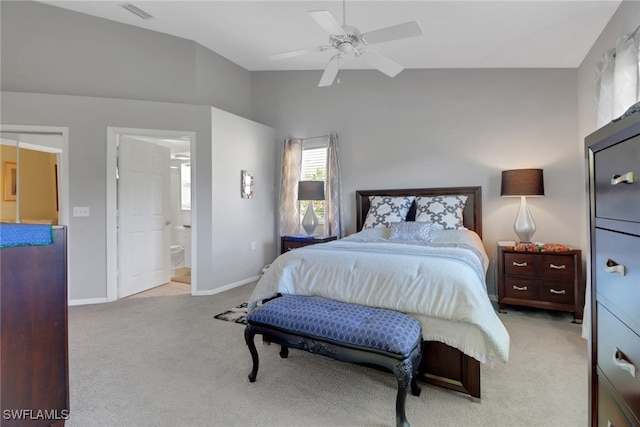 22741 Sandy Bay Dr Unit 201, Estero, FL 33928 - carpeted bedroom with visible vents, lofted ceiling, a ceiling fan, ensuite bath, and baseboards