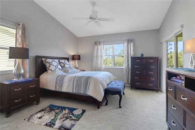 22741 Sandy Bay Dr Unit 201, Estero, FL 33928 - bedroom with light colored carpet, ceiling fan, and vaulted ceiling