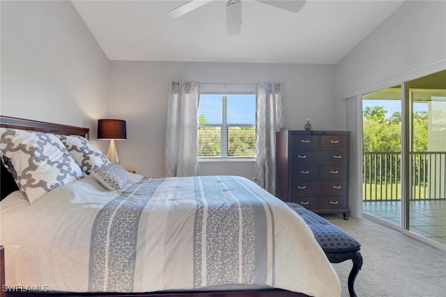 22741 Sandy Bay Dr Unit 201, Estero, FL 33928 - carpeted bedroom with access to exterior, ceiling fan, and lofted ceiling