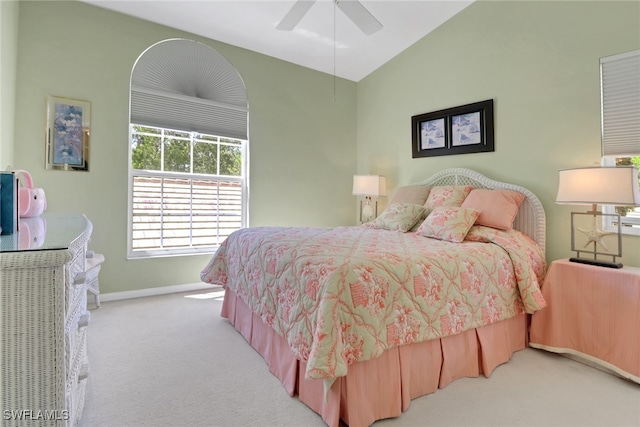 22741 Sandy Bay Dr Unit 201, Estero, FL 33928 - bedroom featuring baseboards, light colored carpet, a ceiling fan, and vaulted ceiling