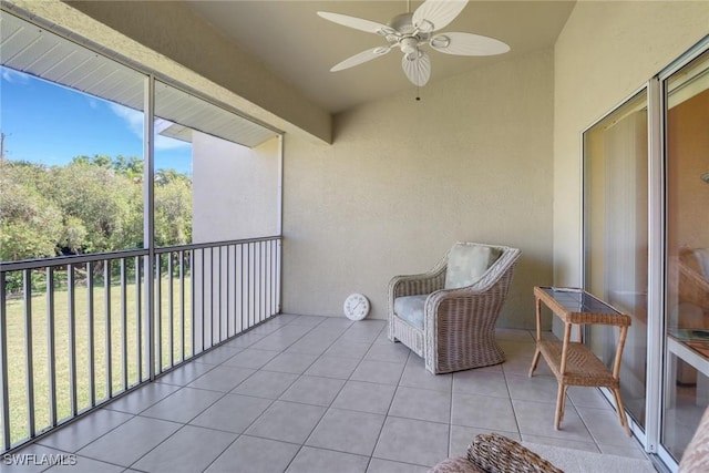 22741 Sandy Bay Dr Unit 201, Estero, FL 33928 - balcony featuring a ceiling fan