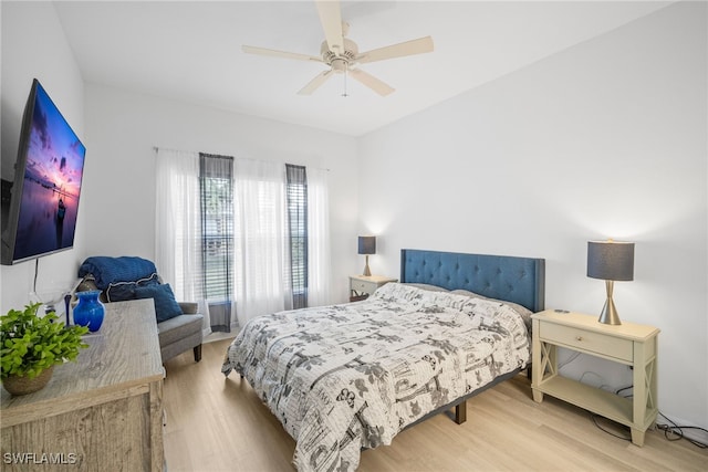 bedroom with ceiling fan and wood finished floors