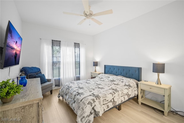 10735 Blue Bimini Cir, Estero, FL 33928 - bedroom featuring wood finished floors and ceiling fan
