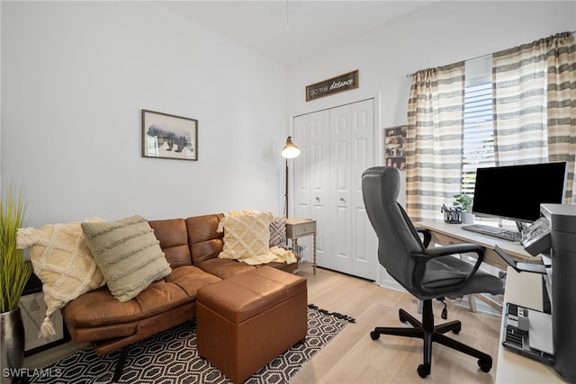 office space with light wood-style floors