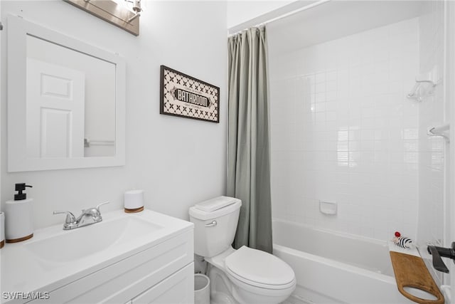 bathroom with shower / bath combo, vanity, and toilet