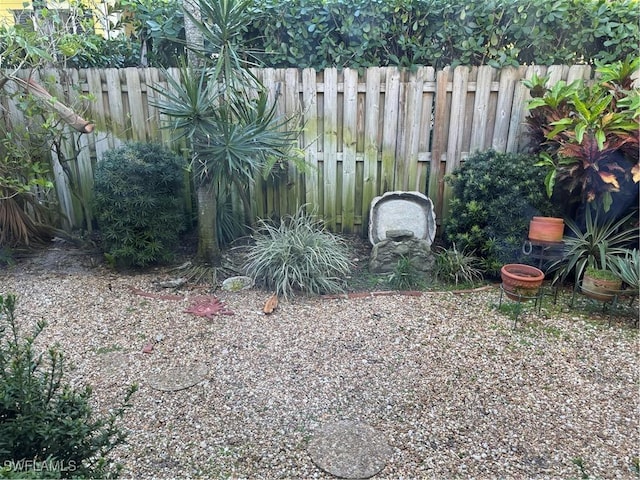 view of yard with fence