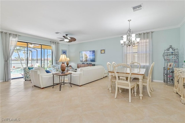 dining space with crown molding, light tile patterned floors, visible vents, baseboards, and ceiling fan with notable chandelier