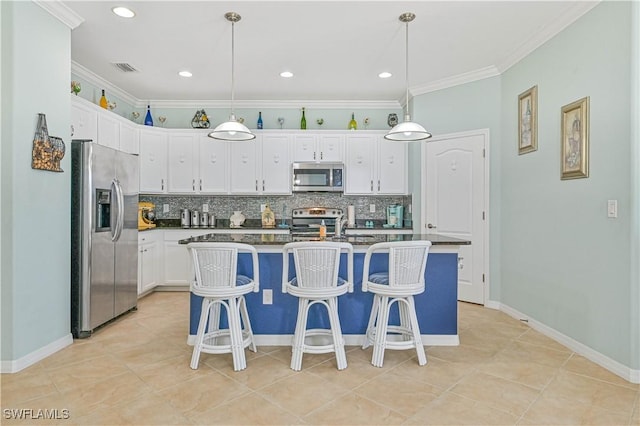 kitchen with tasteful backsplash, white cabinetry, stainless steel appliances, and ornamental molding