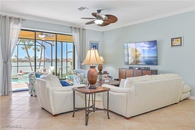 tiled living area featuring a sunroom, ceiling fan, visible vents, and ornamental molding