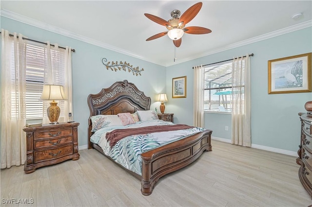 bedroom featuring ceiling fan, ornamental molding, wood finished floors, and baseboards