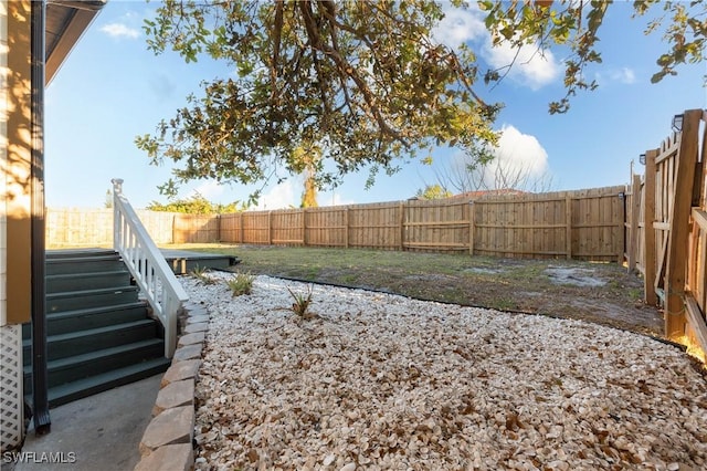 view of yard featuring a fenced backyard