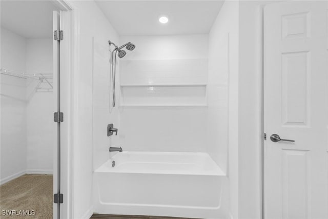 full bathroom with shower / bathtub combination and a spacious closet