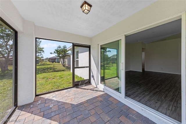 view of unfurnished sunroom